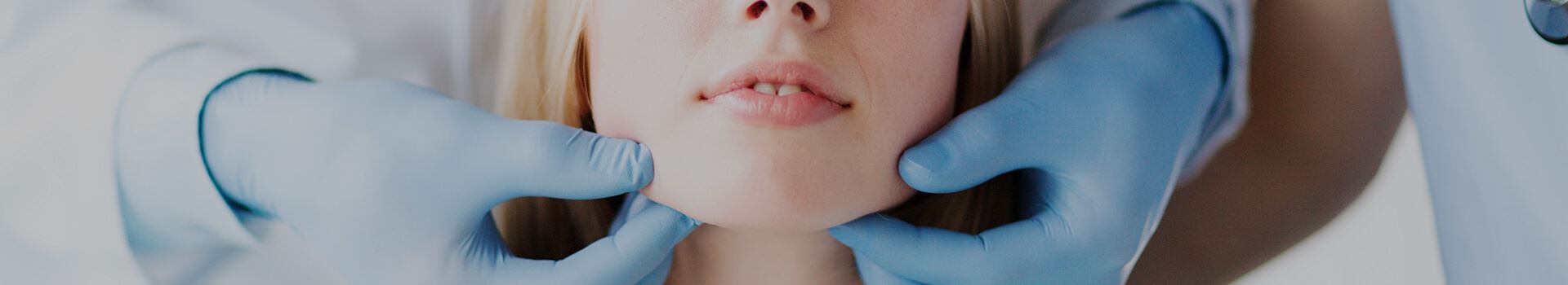 woman receiving cosmetic surgery info