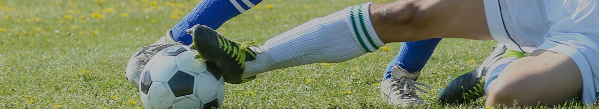 soccer ball being kicked